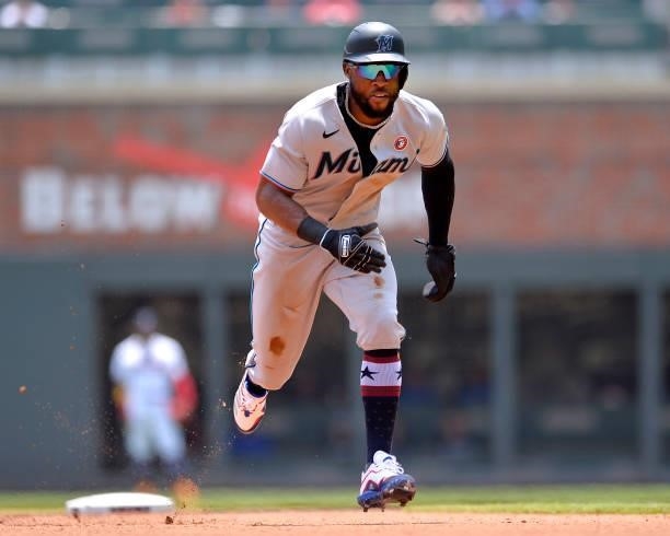 Starling Marte of the Miami Marlins runs to third base in the fourth inning against the Atlanta Braves at Truist Park on July 4, 2021 in Atlanta,...