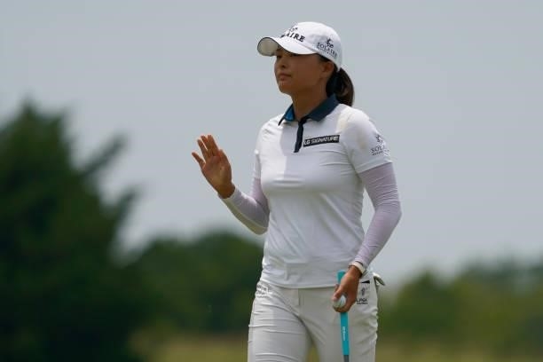 Jin Young Ko of Korea reacts to the crowd after her birdie putt on the second hole during the final round of the Volunteers of America Classic at the...