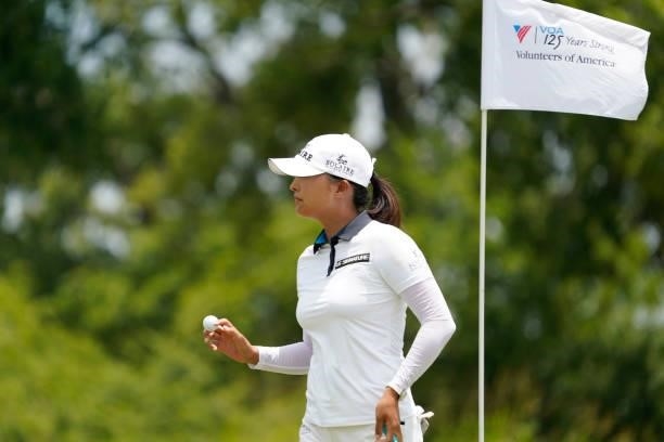 Jin Young Ko of Korea reacts to the crowd after her putt on the first hole during the final round of the Volunteers of America Classic at the Old...