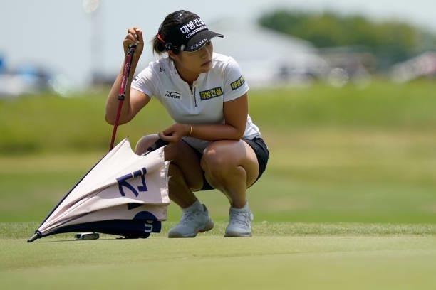 Jeongeun Lee6 of Korea lines up a putt on the first hole during the final round of the Volunteers of America Classic at the Old American Golf Club on...