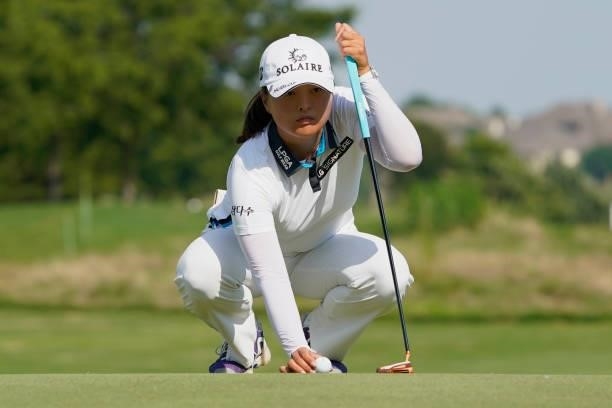 Jin Young Ko of Korea lines up a putt on the 12th hole during the final round of the Volunteers of America Classic at the Old American Golf Club on...