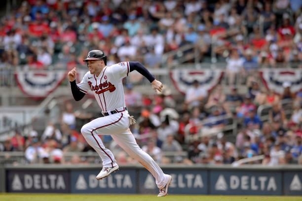 Freddie Freeman of the Atlanta Braves attempts to steal second base in the eighth inning against the Miami Marlins at Truist Park on July 4, 2021 in...