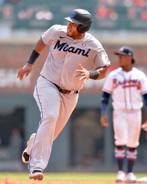 Jesús Aguilar of the Miami Marlins runs to third base in the eighth inning against the Atlanta Braves at Truist Park on July 4, 2021 in Atlanta,...
