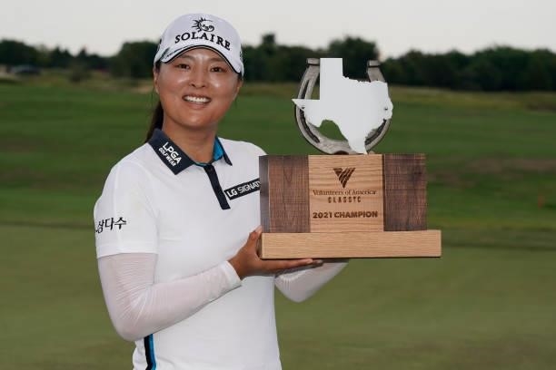 Jin Young Ko of Korea poses with the trophy after winning the Volunteers of America Classic at the Old American Golf Club on July 4, 2021 in The...