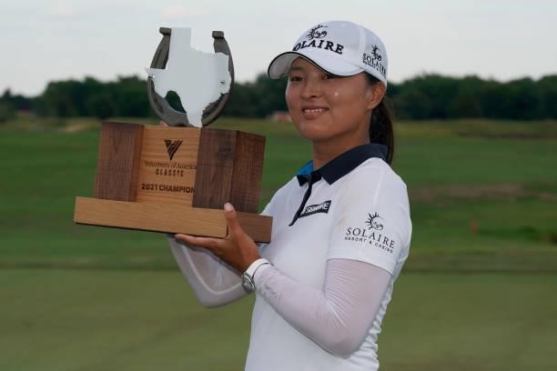 Jin Young Ko of Korea poses with the trophy after winning the Volunteers of America Classic at the Old American Golf Club on July 4, 2021 in The...