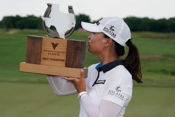 Jin Young Ko of Korea kisses the trophy after winning the Volunteers of America Classic at the Old American Golf Club on July 4, 2021 in The Colony,...