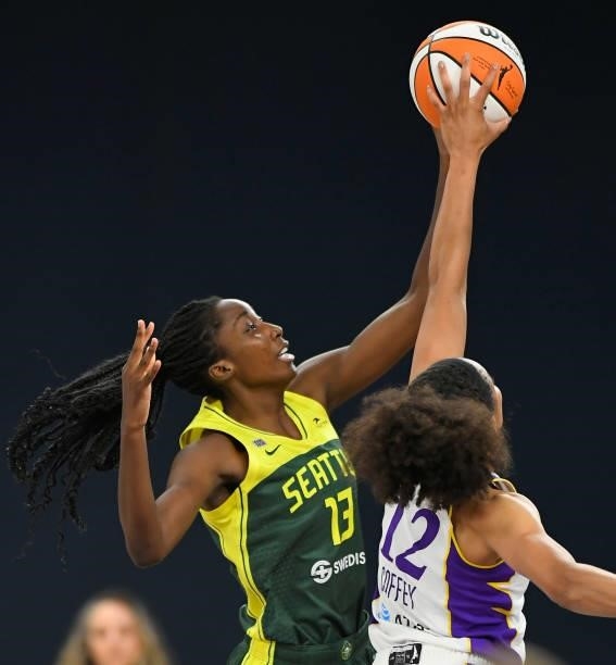 Nia Coffey of the Los Angeles Sparks blocks a shot by Ezi Magbegor of the Seattle Stormat the Los Angeles Convention Center on July 4, 2021 in Los...