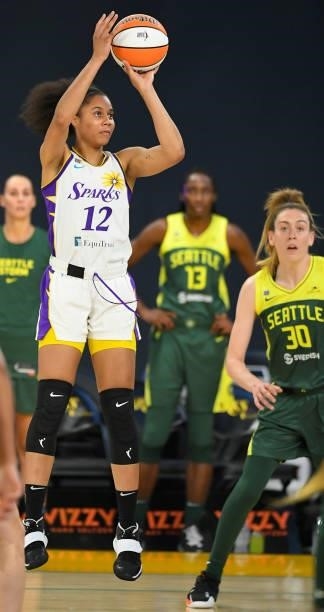 Nia Coffey of the Los Angeles Sparks shoots a jump shot as Breanna Stewart of the Seattle Storm looks on in the first half at the Los Angeles...