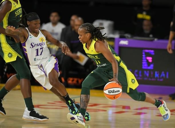 Erica Wheeler of the Los Angeles Sparks guards Epiphanny Prince of the Seattle Storm at the Los Angeles Convention Center on July 4, 2021 in Los...