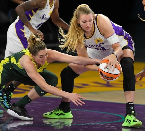 Lauren Cox of the Los Angeles Sparks takes the ball away from Katie Lou Samuelson of the Seattle Storm at the Los Angeles Convention Center on July...
