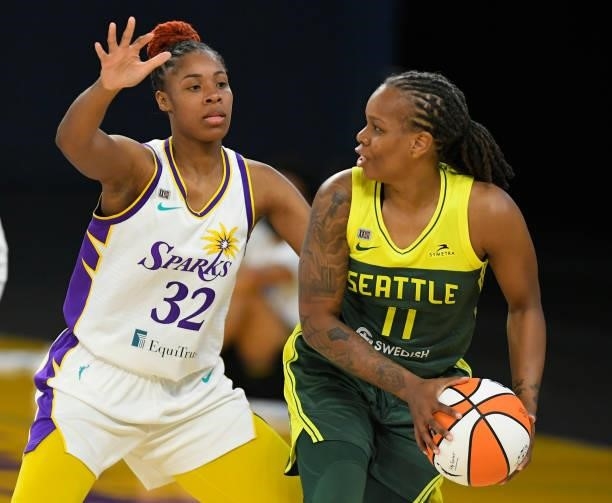Bria Holmes of the Los Angeles Sparks guards Epiphanny Prince of the Seattle Storm at the Los Angeles Convention Center on July 4, 2021 in Los...