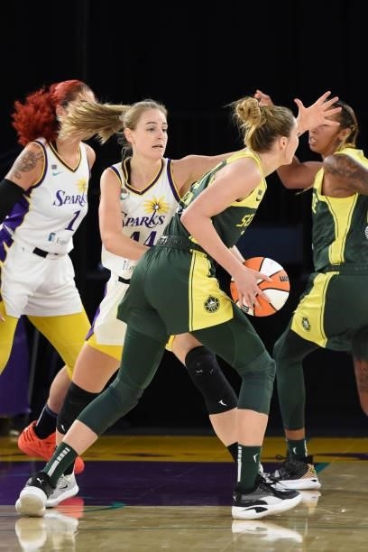 Karlie Samuelson of the Los Angeles Sparks plays defense against Katie Lou Samuelson of the Seattle Storm during the game on July 4, 2021 at Los...