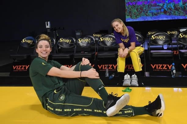 Katie Lou Samuelson of the Seattle Storm and Karlie Samuelson of the Los Angeles Sparks stretch before the game on July 4, 2021 at Los Angeles...