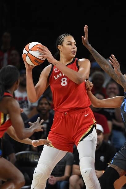 Liz Cambage of the Las Vegas Aces gets looks to pass the ball against the Atlanta Dream on July 4, 2021 at Michelob ULTRA Arena in Las Vegas, Nevada....