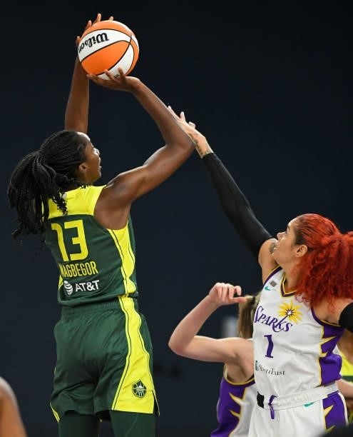 Ezi Magbegor of the Seattle Storm shoots over Amanda Zahui B of the Los Angeles Sparks at the Los Angeles Convention Center on July 4, 2021 in Los...