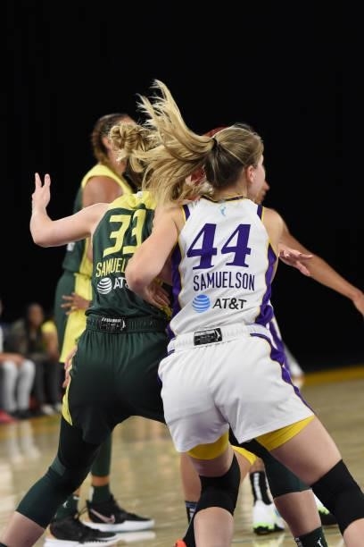 Katie Lou Samuelson of the Seattle Storm fights for position against Karlie Samuelson of the Los Angeles Sparks during the game on July 4, 2021 at...