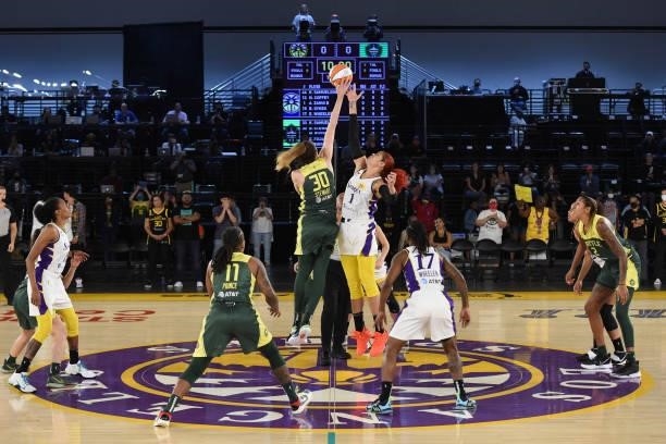 Breanna Stewart of the Seattle Storm and Amanda Zahui B of the Los Angeles Sparks jump during the opening tip-off during the game against the Los...