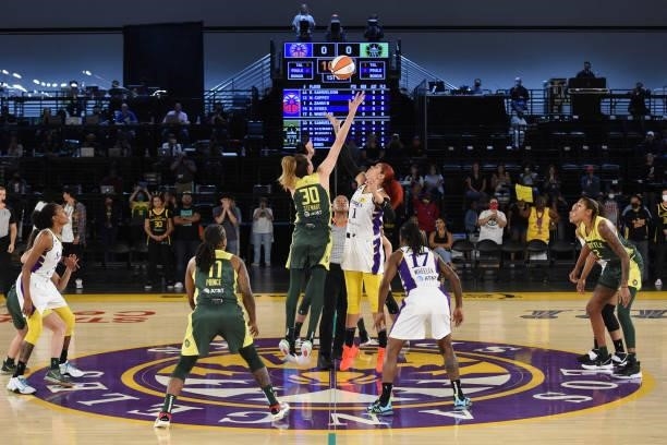 Breanna Stewart of the Seattle Storm and Amanda Zahui B of the Los Angeles Sparks jump during the opening tip-off during the game against the Los...