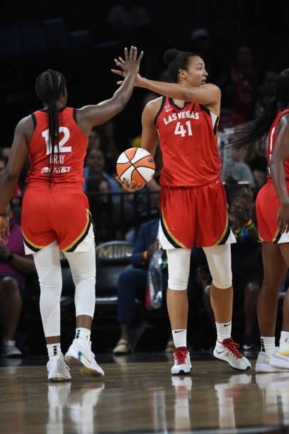 Kiah Stokes of theLas Vegas Aces high fives her teammate during the game against the Atlanta Dream on July 4, 2021 at Michelob ULTRA Arena in Las...