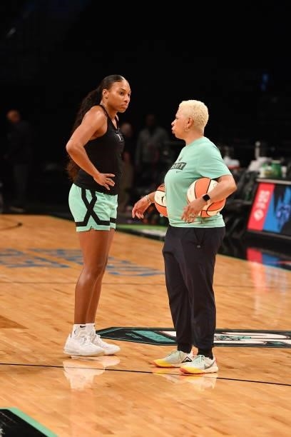 Betnijah Laney of the New York Liberty talks with Assistant Coach Shelley Patterson before the game against the Dallas Wings on July 5, 2021 at the...