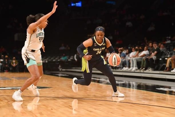 Arike Ogunbowale of the Dallas Wings dribbles the ball against the New York Liberty on July 5, 2021 at the Barclays Center in Brooklyn, New York....