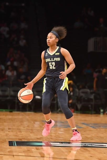Tyasha Harris of the Dallas Wings handles the ball against the New York Liberty on July 5, 2021 at the Barclays Center in Brooklyn, New York. NOTE TO...