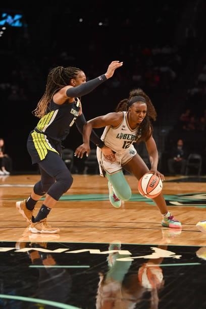 Michaela Onyenwere of the New York Liberty drives to the basket against the Dallas Wings on July 5, 2021 at the Barclays Center in Brooklyn, New...