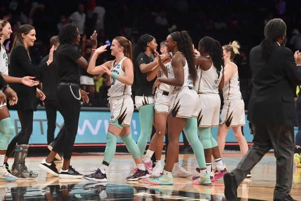 The New York Liberty celebrate after the game against the Dallas Wings on July 5, 2021 at the Barclays Center in Brooklyn, New York. NOTE TO USER:...