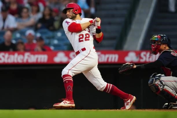 David Fletcher of the Los Angeles Angels connects on a ball to extend his hitting streak to 19 during the game between the Boston Red Sox and the Los...