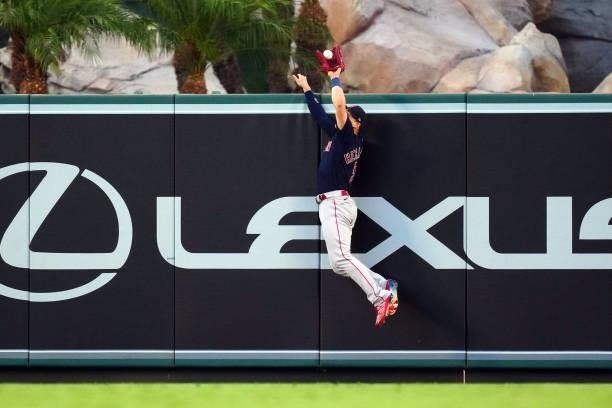 Enrique Hernández of the Boston Red Sox jumps to make a catch during the game between the Boston Red Sox and the Los Angeles Angels at Angel Stadium...
