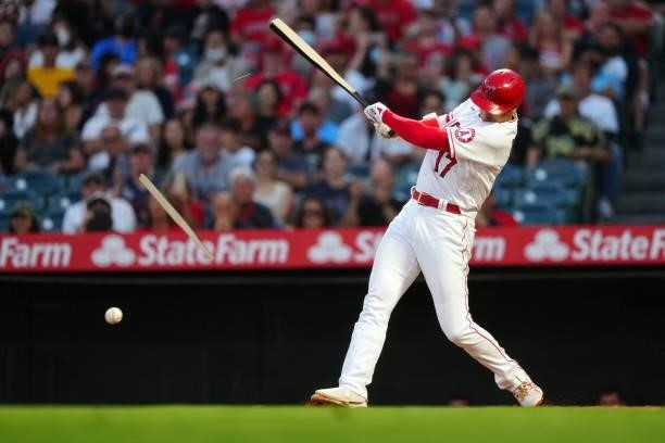 Shohei Ohtani of the Los Angeles Angels breaks his bat during the game between the Boston Red Sox and the Los Angeles Angels at Angel Stadium on...