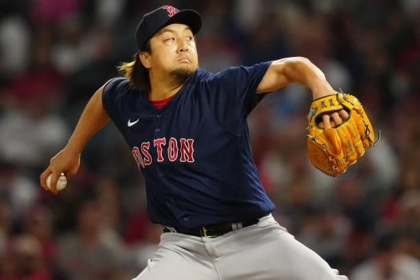 Hirokazu Sawamura of the Boston Red Sox pitches during the game between the Boston Red Sox and the Los Angeles Angels at Angel Stadium on Monday,...