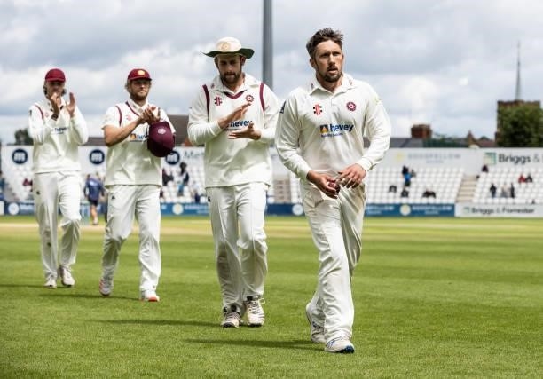 Simon Kerrigan of Northamptonshire leaves the field at the end of the Yorkshire innings having taken five wickets for thirty nine runs during day...