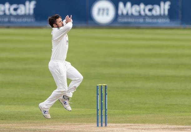 Simon Kerrigan of Northamptonshire in delivery stride during day three of the LV= Insurance County Championship match between Northamptonshire and...