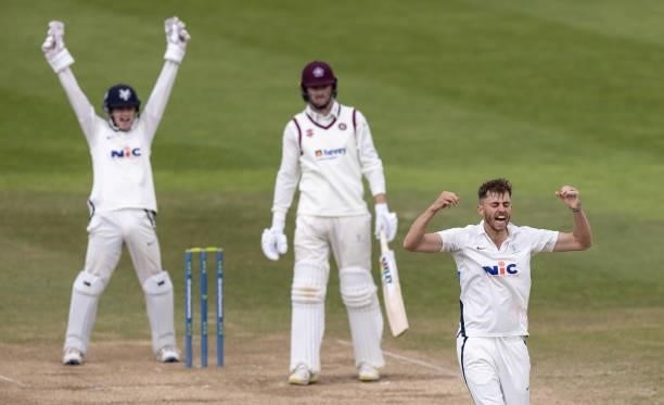 Bowler Ben Coad and wicketkeeper Harry Duke of Yorkshire successfully appeal to the umpire for the wicket of Tom Taylor of Northamptonshire, out lbw,...