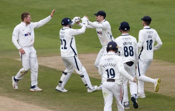 Jordan Thompson of Yorkshire celebrates with wicketkeeper Harry Duke after running out Wayne Parnell of Northamptonshire during day three of the LV=...