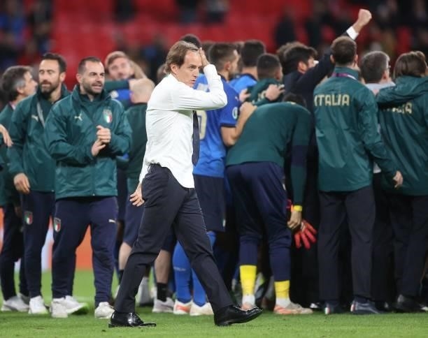 Italy's coach Roberto Mancini celebrates after winning the UEFA EURO 2020 semi-final football match between Italy and Spain at Wembley Stadium in...