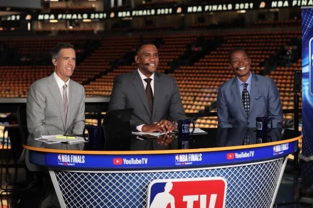 Analysts Matt Winer, Steve Smith and Isiah Thomas pose for a photo before the game between the Milwaukee Bucks and the Phoenix Suns during Game One...