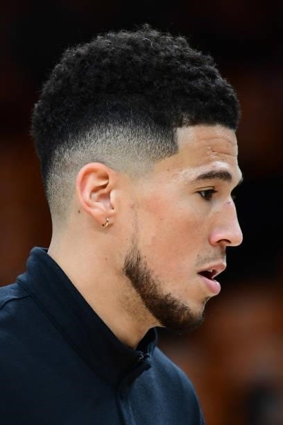 Close up shot of Devin Booker of the Phoenix Suns on court before Game One of the 2021 NBA Finals against the Milwaukee Bucks on July 6, 2021 at...