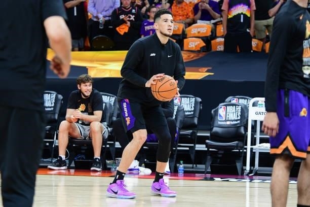 Devin Booker of the Phoenix Suns warms up before Game One of the 2021 NBA Finals against the Milwaukee Bucks on July 6, 2021 at Phoenix Suns Arena in...