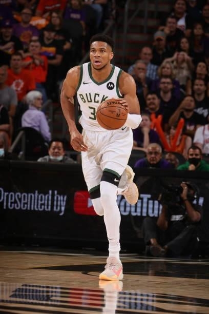 Giannis Antetokounmpo of the Milwaukee Bucks dribbles the ball down court against the Phoenix Suns during Game One of the 2021 NBA Finals on July 6,...