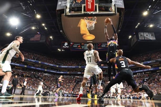 Deandre Ayton of the Phoenix Suns rebounds the ball during the game against the Milwaukee Bucks during Game One of the 2021 NBA Finals on July 6,...