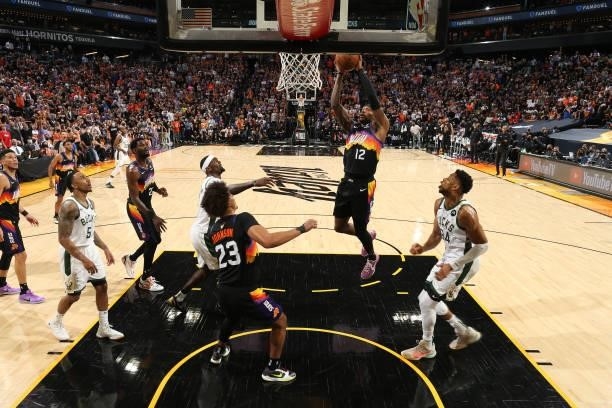Torrey Craig of the Phoenix Suns drives to the basket against the Milwaukee Bucks during Game One of the 2021 NBA Finals on July 6, 2021 at Talking...