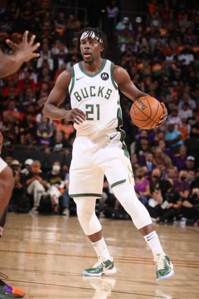 Jrue Holiday of the Milwaukee Bucks dribbles the ball against the Phoenix Suns during Game One of the 2021 NBA Finals on July 6, 2021 at Talking...