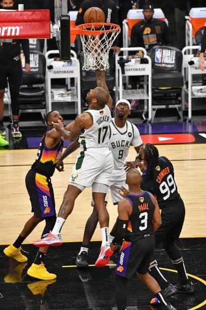 Tucker of the Milwaukee Bucks drives to the basket against the Phoenix Suns during Game One of the 2021 NBA Finals on July 6, 2021 at Phoenix Suns...