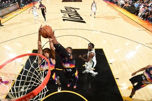 Cameron Payne of the Phoenix Suns and Jae Crowder of the Phoenix Suns fight for the rebound during Game One of the 2021 NBA Finals on July 6, 2021 at...