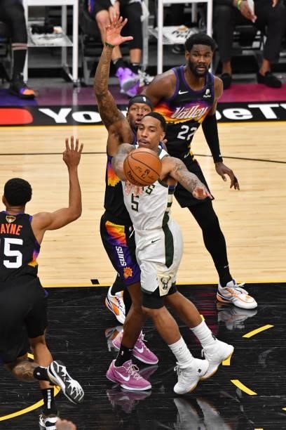 Jeff Teague of the Milwaukee Bucks passes the ball against the Phoenix Suns during Game One of the 2021 NBA Finals on July 6, 2021 at Phoenix Suns...