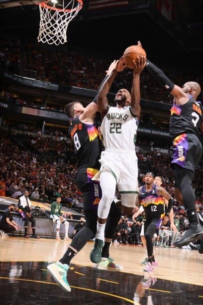 Khris Middleton of the Milwaukee Bucks drives to the basket against the Phoenix Suns during Game One of the 2021 NBA Finals on July 6, 2021 at...