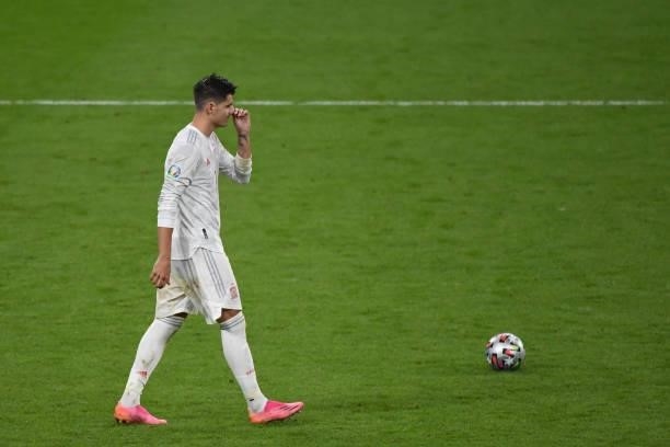 Alvaro Morata of Spain regirets missing the penalty kick during the UEFA Euro 2020 Championship Semi-final match between Italy and Spain at Wembley...