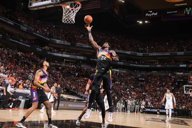 Deandre Ayton of the Phoenix Suns rebounds the ball against the Milwaukee Bucks during Game One of the 2021 NBA Finals on July 6, 2021 at Talking...